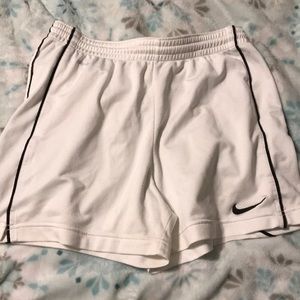 White Nike shorts